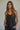 Zia Top black camisole with relaxed fit and spaghetti strap design.