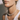 Matte Pearl Necklaces collection image featuring a close-up of a model wearing a classic pearl necklace styled with a white tank top in warm natural light.