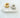 Two Adelaide ear cuffs, one gold-colored and one silver-colored, placed side by side on a white surface.