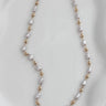 Alexa gold plated necklace with 3mm pearls on white background, minimal and versatile design