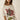 Alina Tee oversized cream graphic t-shirt with vintage-inspired red floral bloom and green leaves print, relaxed fit short sleeves, styled casually on model against neutral studio background.