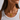 Amaita Necklace gold textured heart pendant necklace worn on model showing bold statement pendant and delicate cord chain.