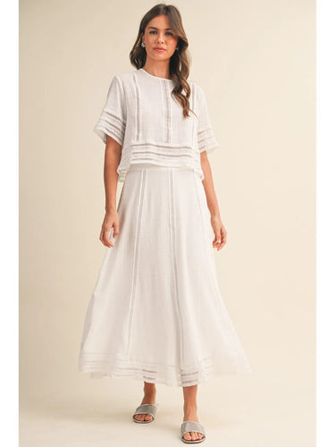 Amirkat Set white two-piece skirt set front view highlighting airy drape and relaxed feminine fit