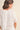 Amirkat Set close-up of lace fabric texture on white top showing delicate pattern and breathable material