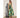 Amura Maxi Dress front view on model wearing tropical green botanical print maxi dress.