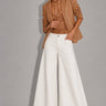 Annalise Wide Leg Palazzo Jeans in white featuring a high-rise waist, oversized palazzo legs, structured denim, classic five-pocket design, and a full-length wide hem.