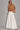 Annalise Wide Leg Palazzo Jeans in white featuring a high-rise waist, oversized palazzo legs, structured denim, classic five-pocket design, and a full-length wide hem.