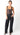 Atta Bodysuit full body look featuring black lace corset bodysuit paired with black jeans, showing flattering structured fit and lingerie-inspired detailing designed for parties and after-dark styling.