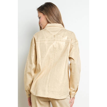 Gold metallic foil button-up shirt jacket with a relaxed fit and denim-inspired seams, shown on model from back — Aurea Shirt Jacket by Matte.
