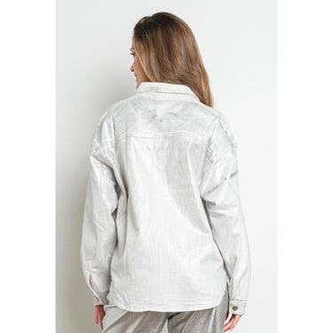 Silver metallic foil button-up shirt jacket with a relaxed fit and denim-inspired seams, shown on model from back — Aurea Shirt Jacket by Matte.