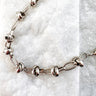 Silver plated link bracelet with bold knot details on marble background – Matte Jewelry Collection