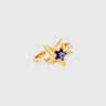 Gold ring with blue star-shaped crystal on silver surface – Azra Ring by Matte.