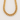 Belle Necklace chunky gold Cuban link chain necklace with oversized polished links on soft warm ivory background, luxury statement jewelry product photo with high-shine gold finish and bold modern silhouette.
