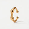 Bone Ear Cuff in glossy gold featuring an abstract molten-inspired shape with rounded sculptural edges and a modern open cuff design on a clean neutral background.