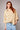 Bornandt Blouse worn by model, front view, featuring relaxed button-down fit and delicate embellished detailing.