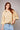 Bornandt Blouse worn by model, front view, highlighting fluid fit and refined casual styling.