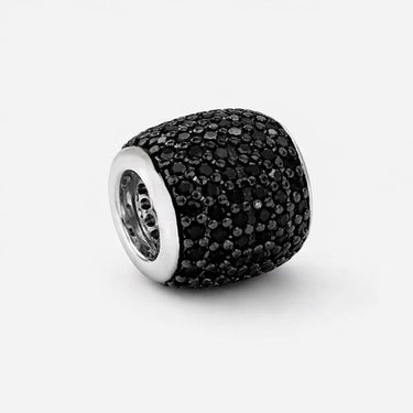 Carmela Charm black pavé crystal charm variation with dark stones and glossy finish highlighting bold contrast and sculptural shape