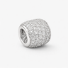 Carmela Charm silver crystal charm close-up with full pavé zirconia stones on curved cylindrical silhouette on light neutral background with soft shadow