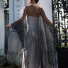 Chalat Kimono worn by model, back view outdoors, highlighting sheer open-knit texture and long fringe drape