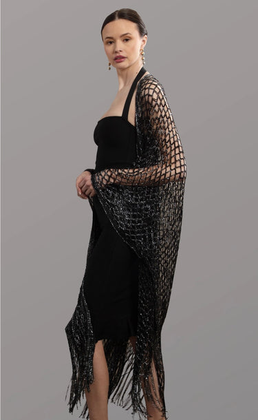 Chalat Kimono worn by model, side view, highlighting dramatic fringe and metallic crochet finish.
