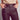 Close up of chocolate brown faux leather wide leg trousers with button closure and front pockets, cropped length design