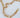 Bophal gold-filled link necklace with a chunky link by Matte design laid out on a white surface.