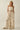 Ciguu Printed Halter Jumpsuit front view showing wide leg silhouette and neutral resort print