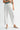 Clea Pant white cropped pants front view showing embroidery detailing along leg.