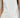 Model wearing the Lennon two-tone ivory satin cami with black faux-leather accents, close up.