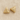 Gold sculpted triangle huggie earrings with cutout detail on linen backdrop, Colette Huggie Earrings.
