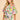 Model wearing the Enus Top in abstract print cotton with short balloon sleeves and relaxed fit. 