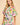 Model wearing the Enus Top in abstract print cotton with short balloon sleeves and relaxed fit. 