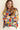 Bold knit design of the Eon Sweater with vibrant color waves.