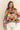 Oversized Eon Sweater with V-neckline, styled with white denim.