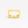 Esther Ring gold rectangular hollow statement ring on neutral background