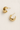 Evelina Hoops Earrings — small gold plated hoops on linen background, minimal, luminous, and elegant jewelry piece by Matte.