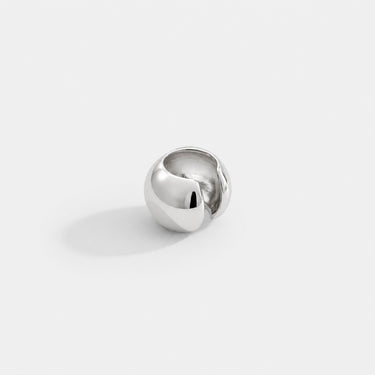 Francis Ear Cuff in polished silver featuring a bold rounded dome silhouette with a smooth high-shine finish, designed as a modern sculptural statement ear cuff on a clean neutral background.