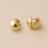 Halott Huggie Earrings with polished finish and rounded huggie design.
