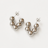 Hasselt Hoop Earrings featuring polished silver-plated hoop earrings with graduated sphere bead clusters, a sculptural rounded silhouette, mirror finish, secure post-back closure, lightweight design, and bold contemporary style, displayed on a soft white background.