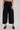 High-Rise Pleated Culotte Pants in black, cropped wide-leg trousers with pleats, belt loops, and front flap pockets