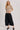 High-Rise Pleated Culotte Pants in black, wide cropped leg trousers with front pleats and sweater styling