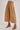 High-Rise Pleated Culotte Pants in taupe, cropped wide-leg design with pleated front and suede boots