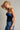 Isti Top strapless navy velvet top angled side pose.