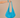 Jaspe Beach Bag in vibrant turquoise cotton with fluid slouchy silhouette and wide strap, designed with a gathered base and soft drape