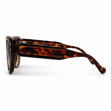 Joyelle Sunglasses with bold oversized square frame in tortoiseshell acetate and brown gradient lenses for a classic statement look, side view.