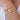 Julian Pearl Charm worn on gold chain close-up styling layered delicate jewelry.