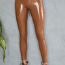 Kaya Faux Leather Leggings high shine caramel fitted leggings front view full length.