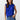 Kian Top worn by model, front view, featuring blue sleeveless draped neckline and soft flowing silhouette