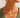 Kinat Necklace worn on model showing delicate chain and clover pendant sitting at collarbone.