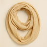 Kisiwa Infiniti Scarf in beige knit fabric, infinity loop design, soft textured neutral scarf styled for fall and winter by Matte.
